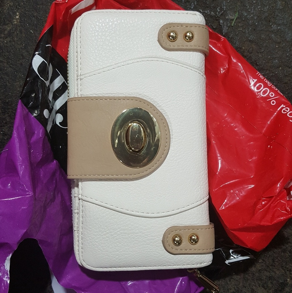 White and Tan colored Wallet